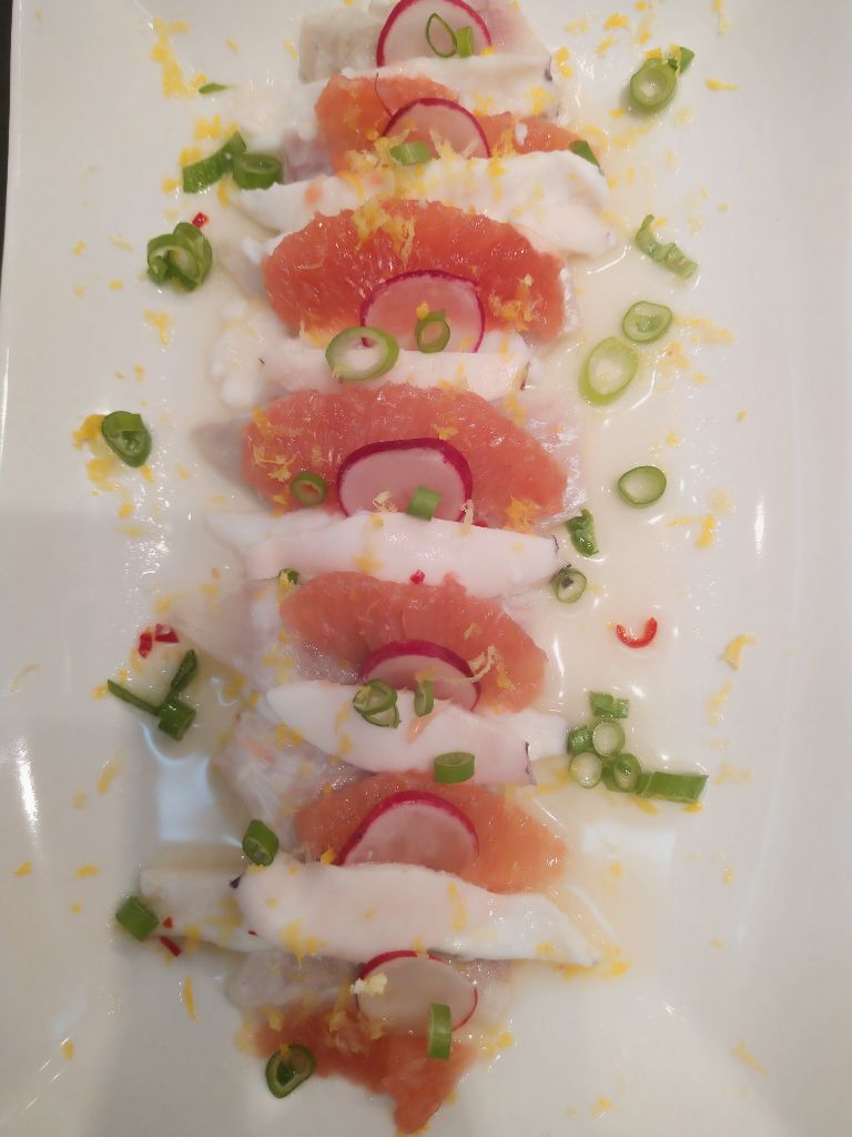 Wolfsbarsch und Calamaretti mariniert